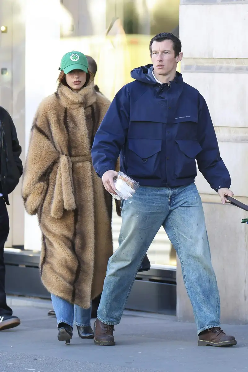 Callum Turner walking in New York wearing BRUT